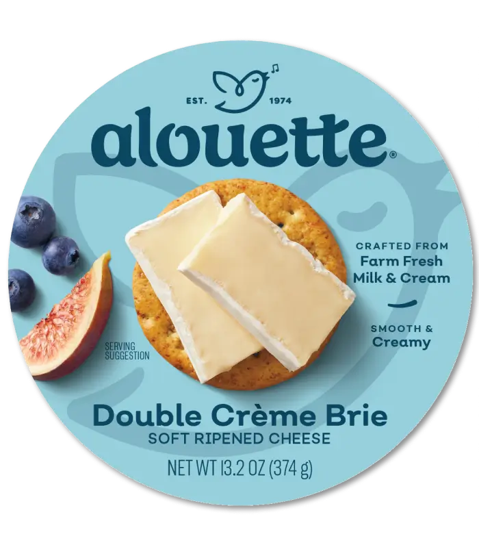 Alouette Double Crème Brie soft ripened cheese package with fresh figs and berries on light blue label, 8 oz.