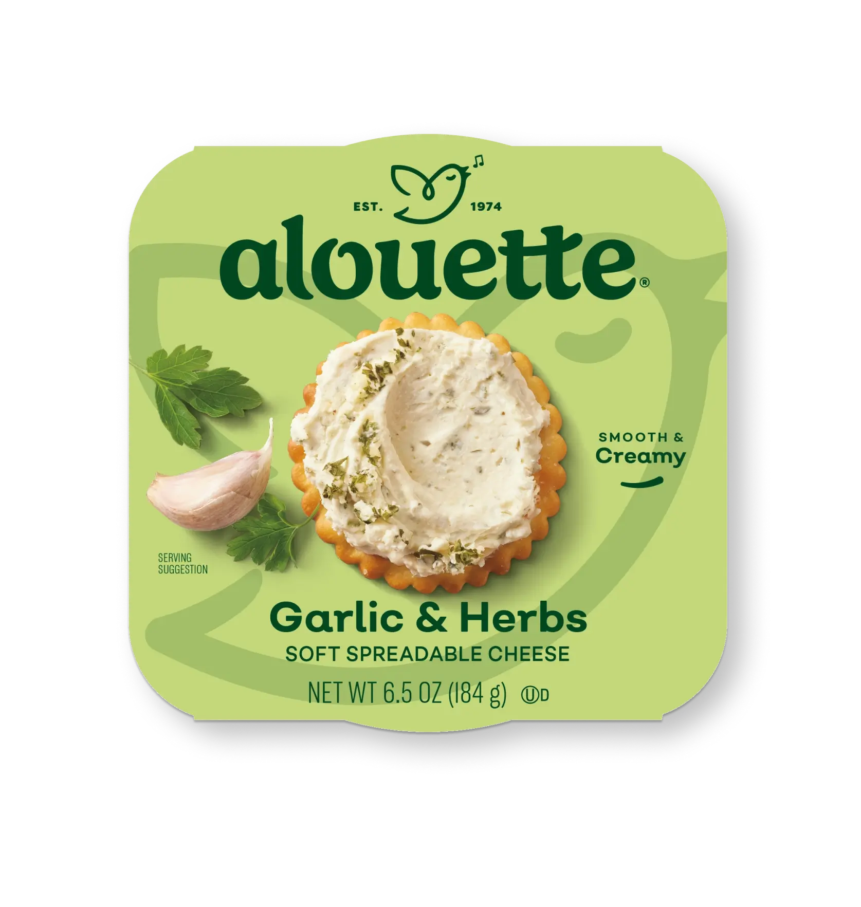 Alouette Garlic & Herbs soft spreadable cheese package, 6.5 oz, with a cracker topped with creamy cheese and herb garnish on lime green background.