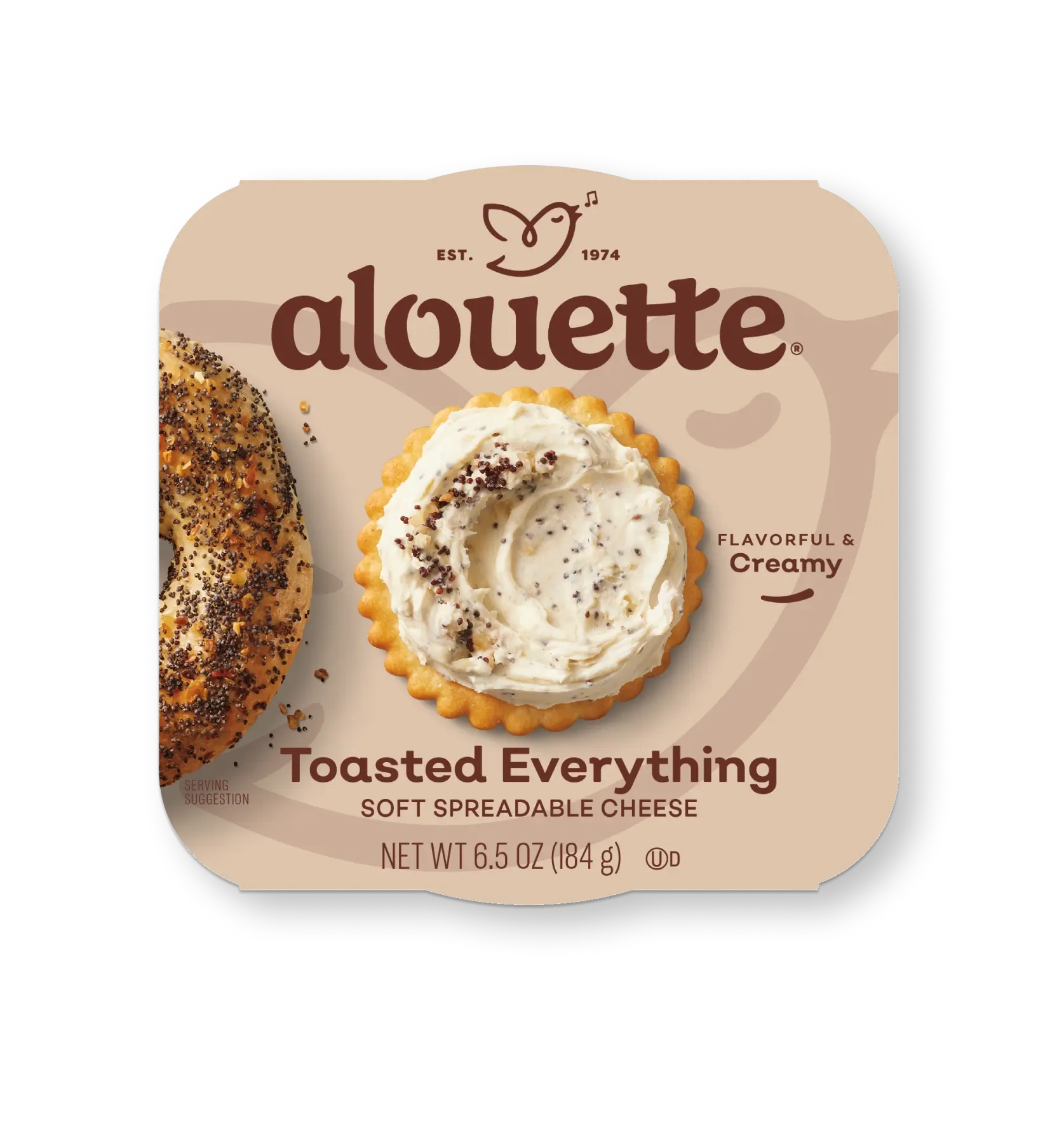 Alouette Toasted Everything soft spreadable cheese package showing a cracker topped with creamy cheese and seasoning, 6.5 oz net weight.